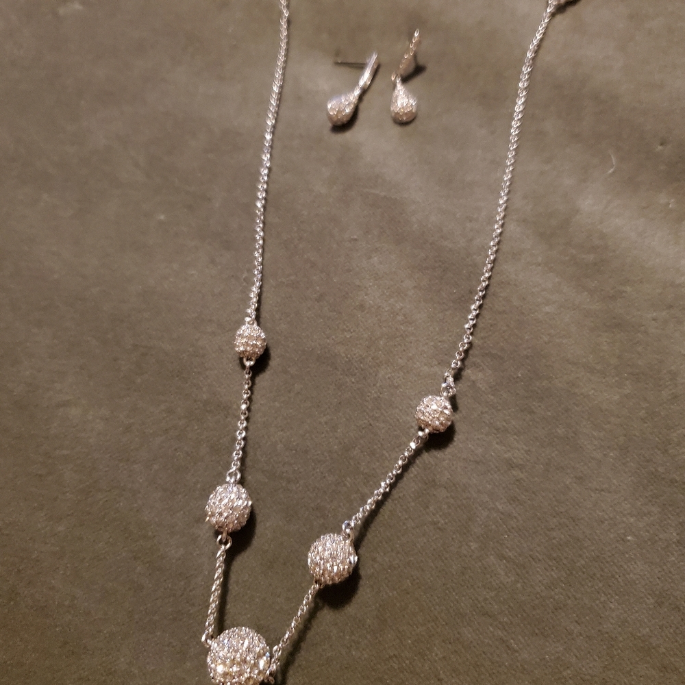 Silver and diamond necklace with matching earrings